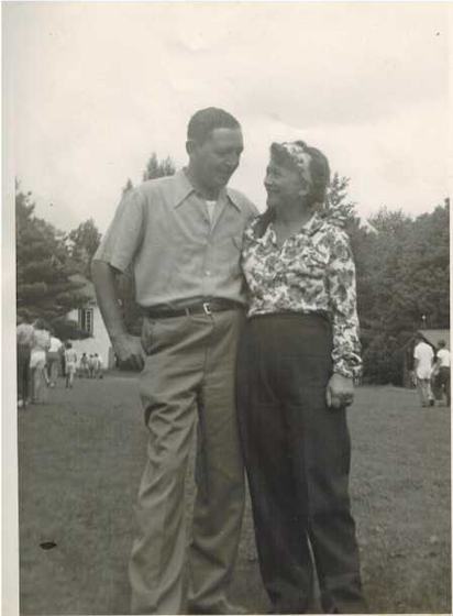 Harold and Mae outdoors in a park.