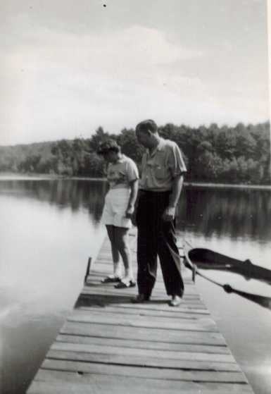 Harold and Mae on a lake dock.