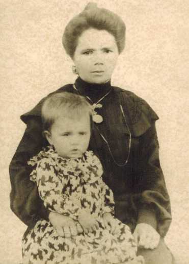 Believed to be Mae as a small child, with her mother.