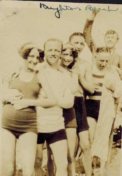 Six friends in bathing suits.
