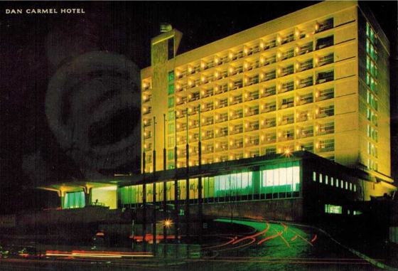 Color postcard of the Dan Carmel Hotel, Haifa, lit up at night. The family says Harold and Mae stayed here.